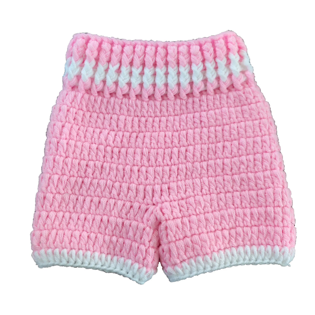 Pink crochet baby boxing shorts and gloves close-up