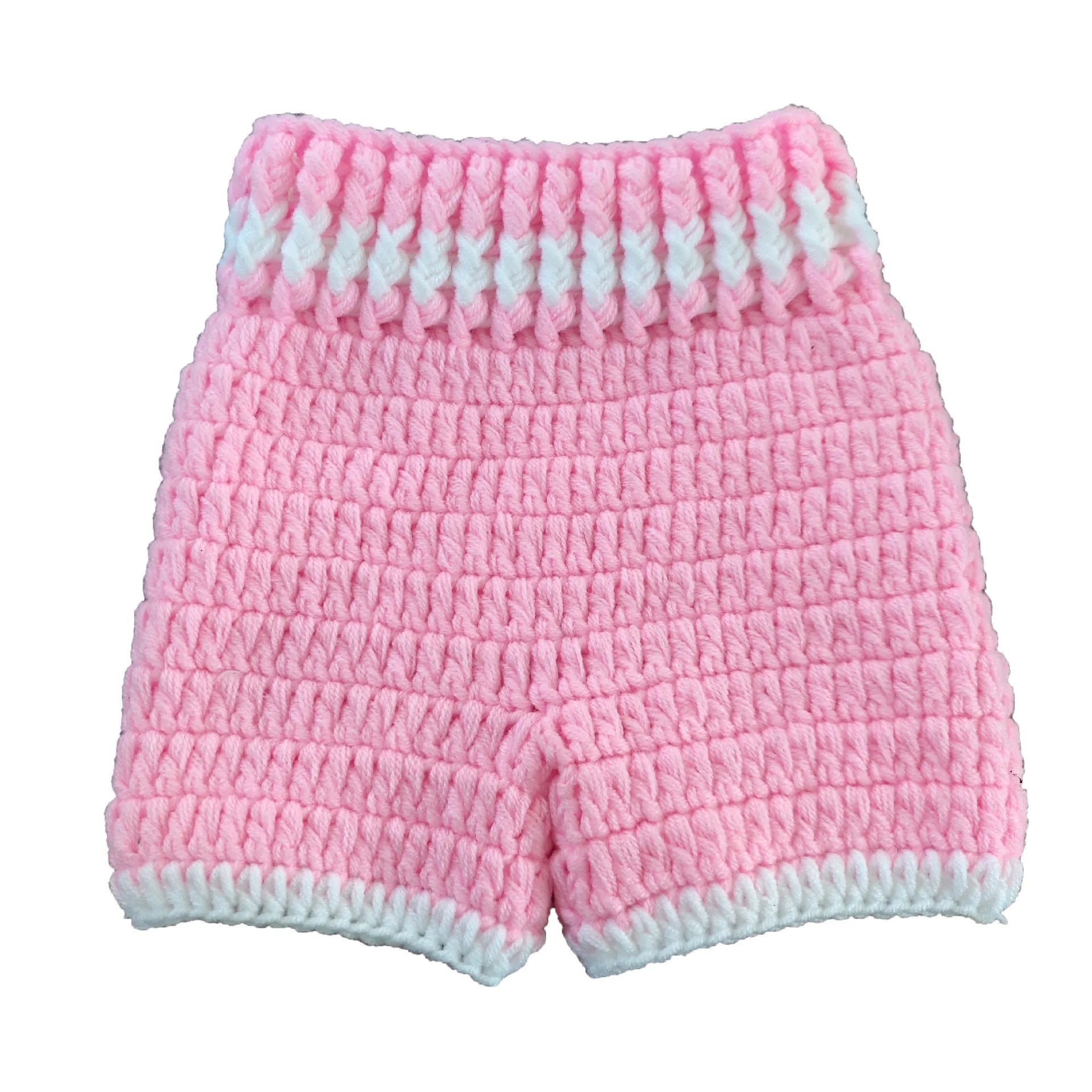 Pink crochet baby boxing shorts and gloves close-up