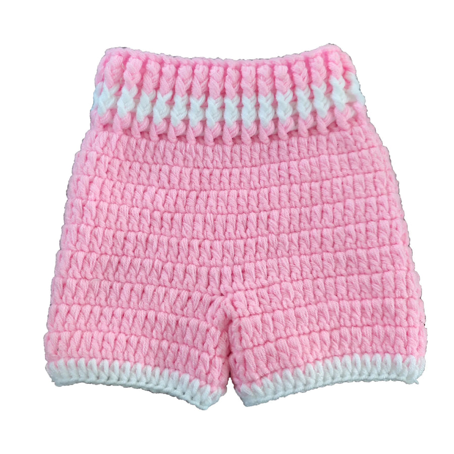 Pink crochet baby boxing shorts and gloves close-up