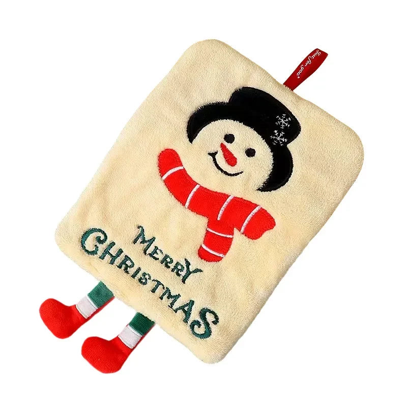 Ivory hanging hand towel with an embroidered snowman, red scarf, and Merry Christmas lettering