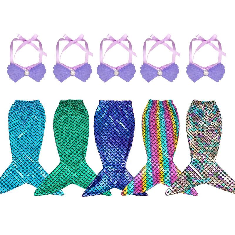 Multiple mermaid tail skirts and purple shell tops