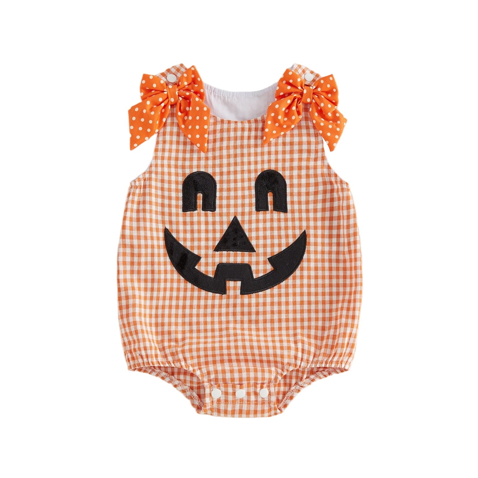 Orange and white plaid baby romper with jack-o'-lantern face and orange polka dot bows on shoulders