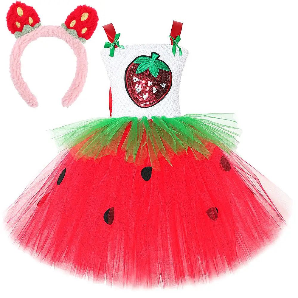 Red tutu dress with white crochet top and sequin strawberry applique, green tulle waist, black seed appliques, and pink fuzzy