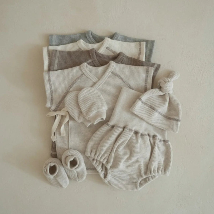 Unisex Two-Piece Casual Pajamas Set with Short Sleeve Top and High Waist Shorts