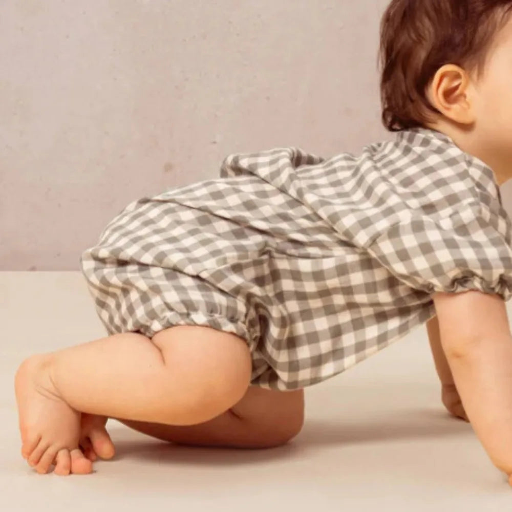 Multiple color options of Triangle Neck Cotton Romper displayed