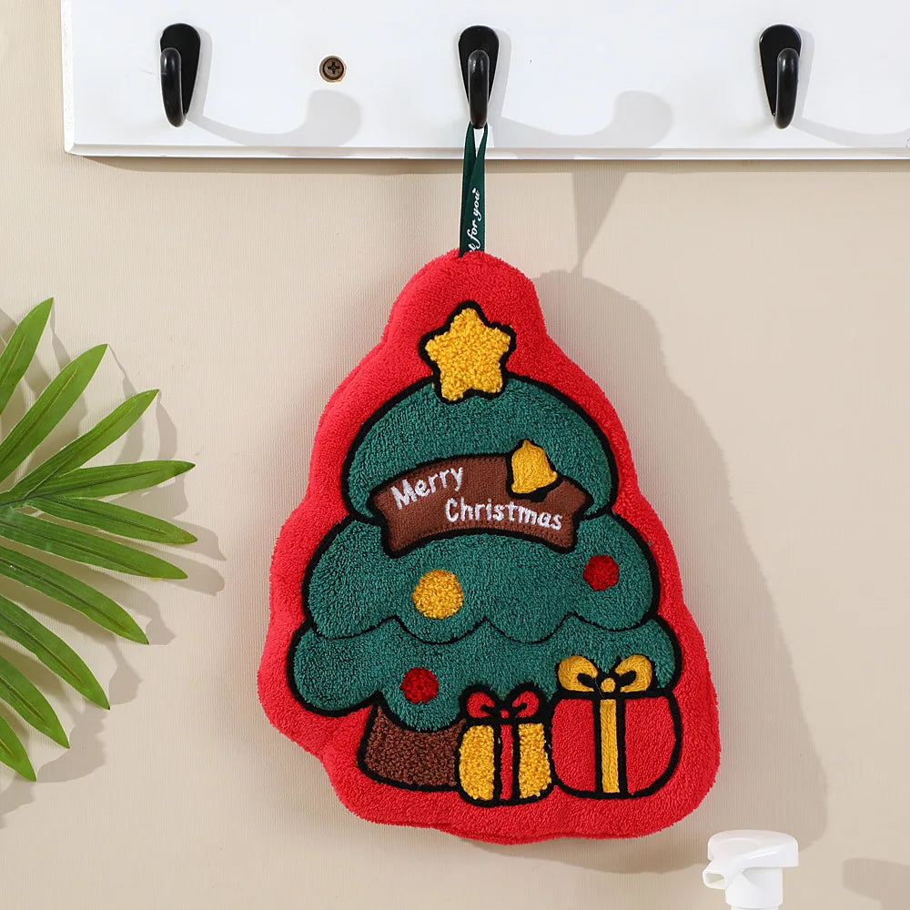 Christmas tree hand towel with a Merry Christmas motif, wrapped gifts, red border, and green hanging loop.