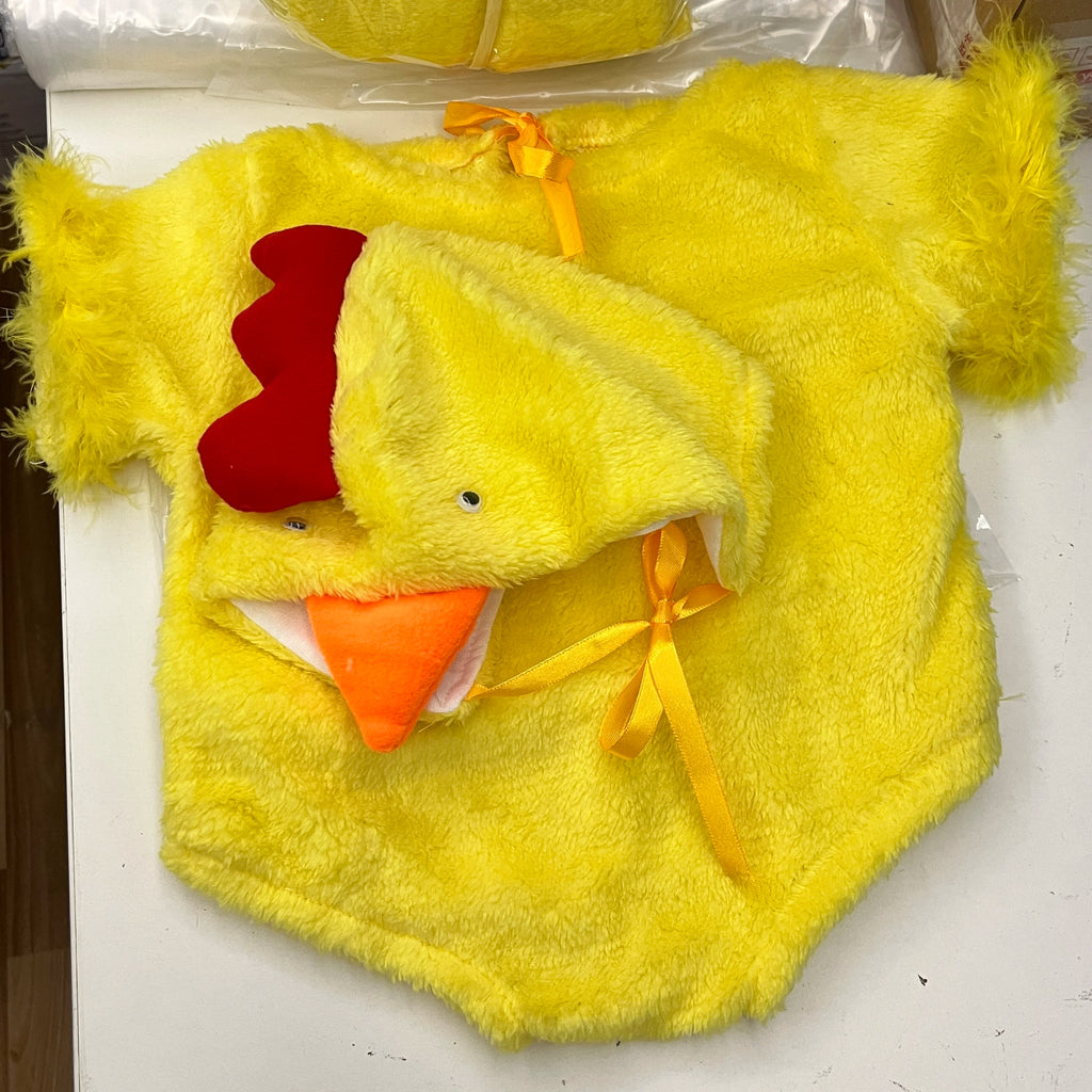 Yellow chicken jumpsuit costume and matching hat laid flat