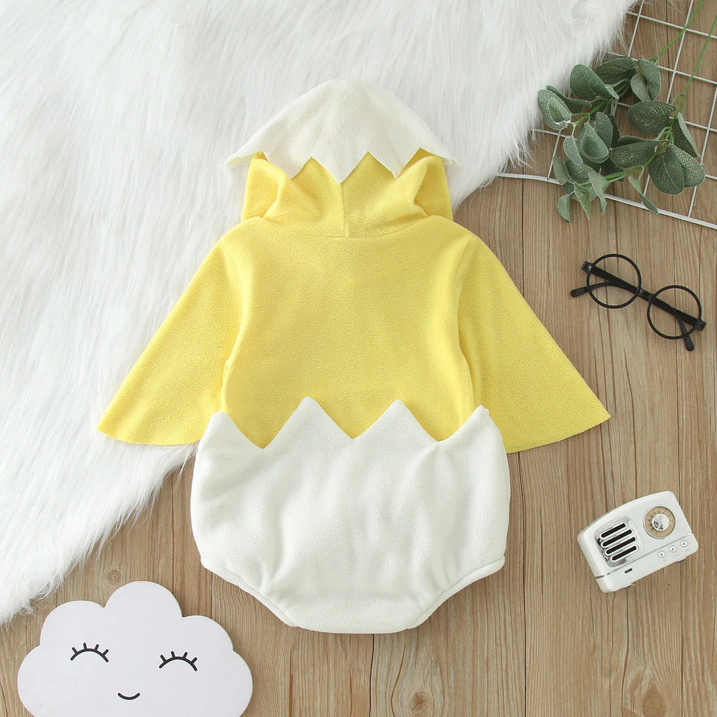 Close-up of snap closures inside white eggshell part of chick costume romper