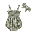 Baby girl romper with covered button closure detail