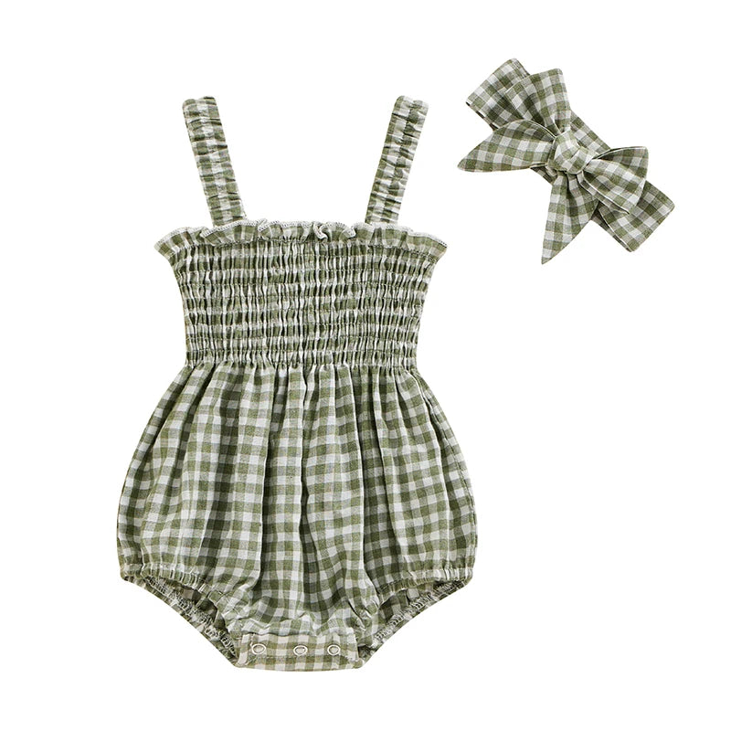 Baby girl romper with covered button closure detail