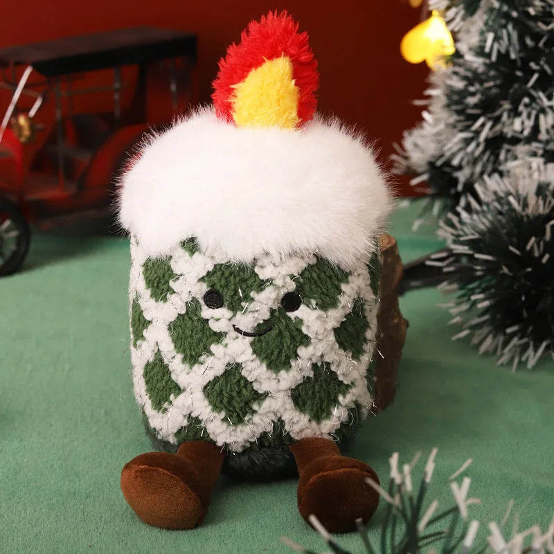 Green Christmas candle plush figure with a white diamond pattern, smiling face, and plush flame