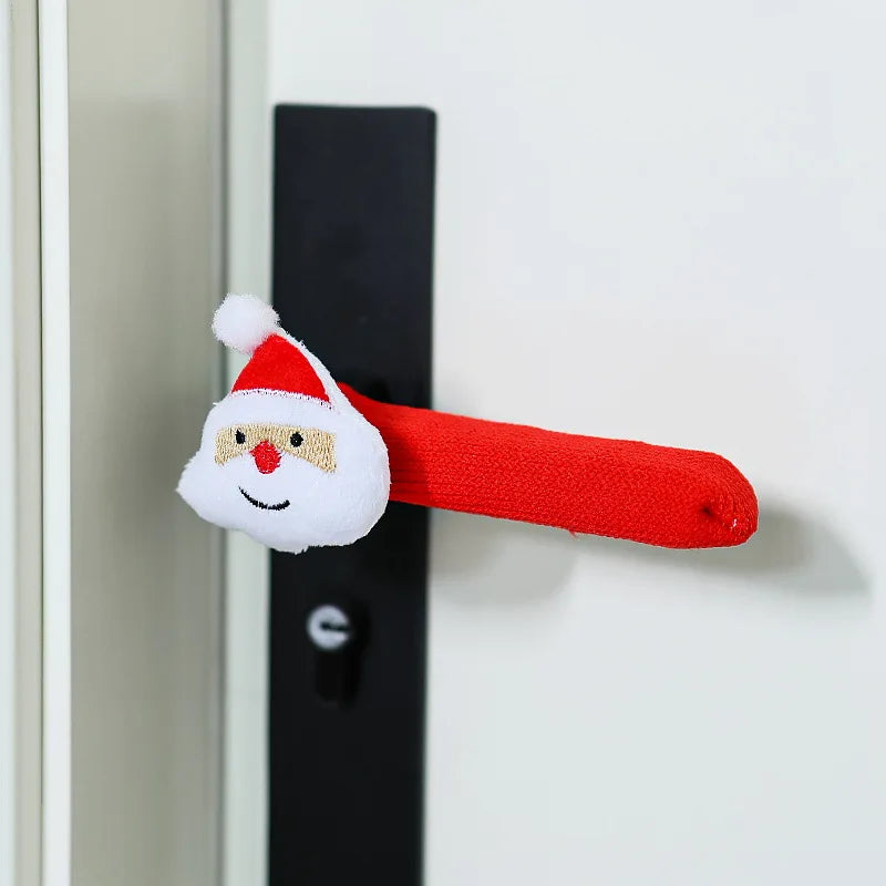 Red fabric door handle cover with a Santa Claus design