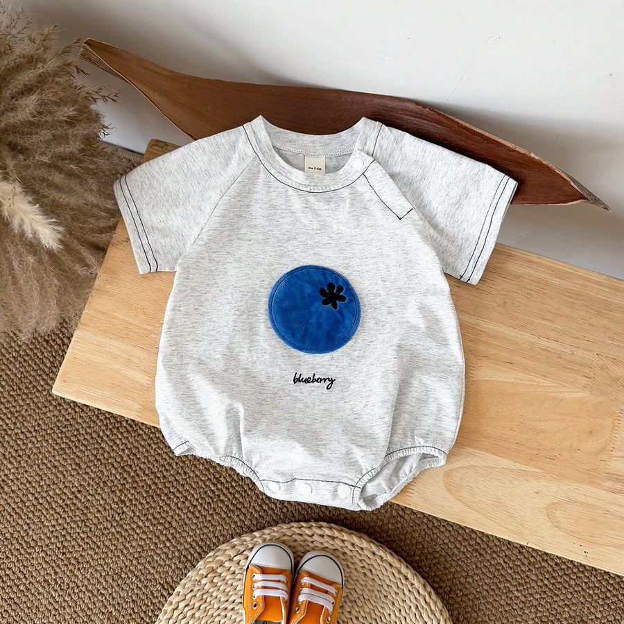 Gray Fruit Patch Bubble Romper flat lay with blue patch