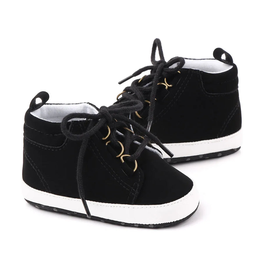 Pair of black high-top baby sneakers