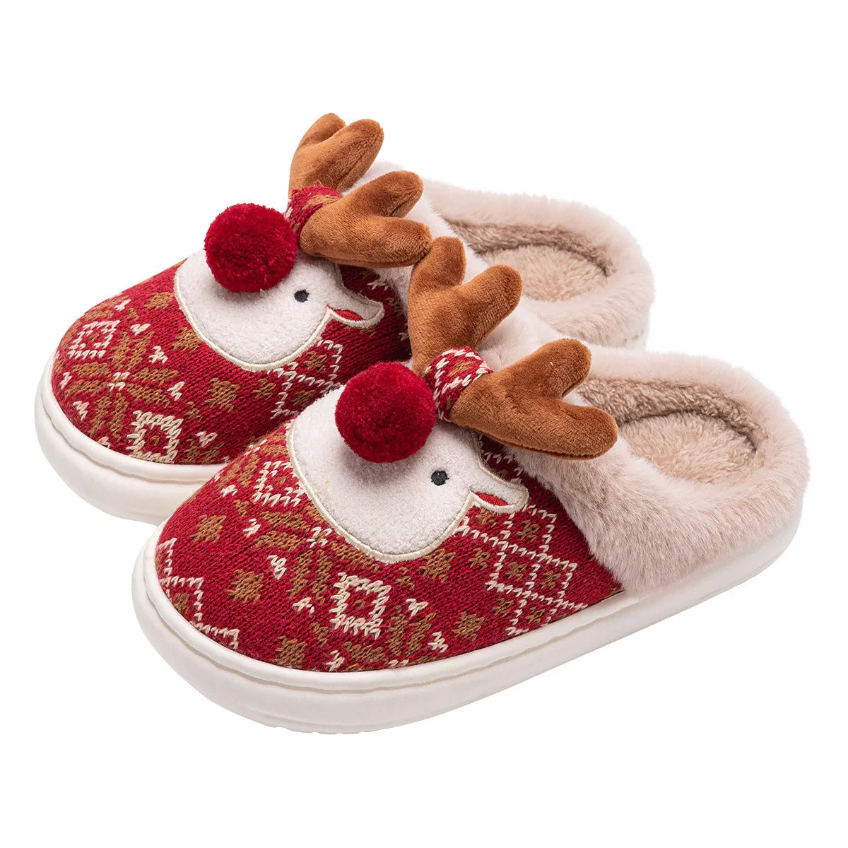 Cranberry patterned slip-on slippers with reindeer faces, brown antlers, red pom-pom noses, and fluffy cream trim.