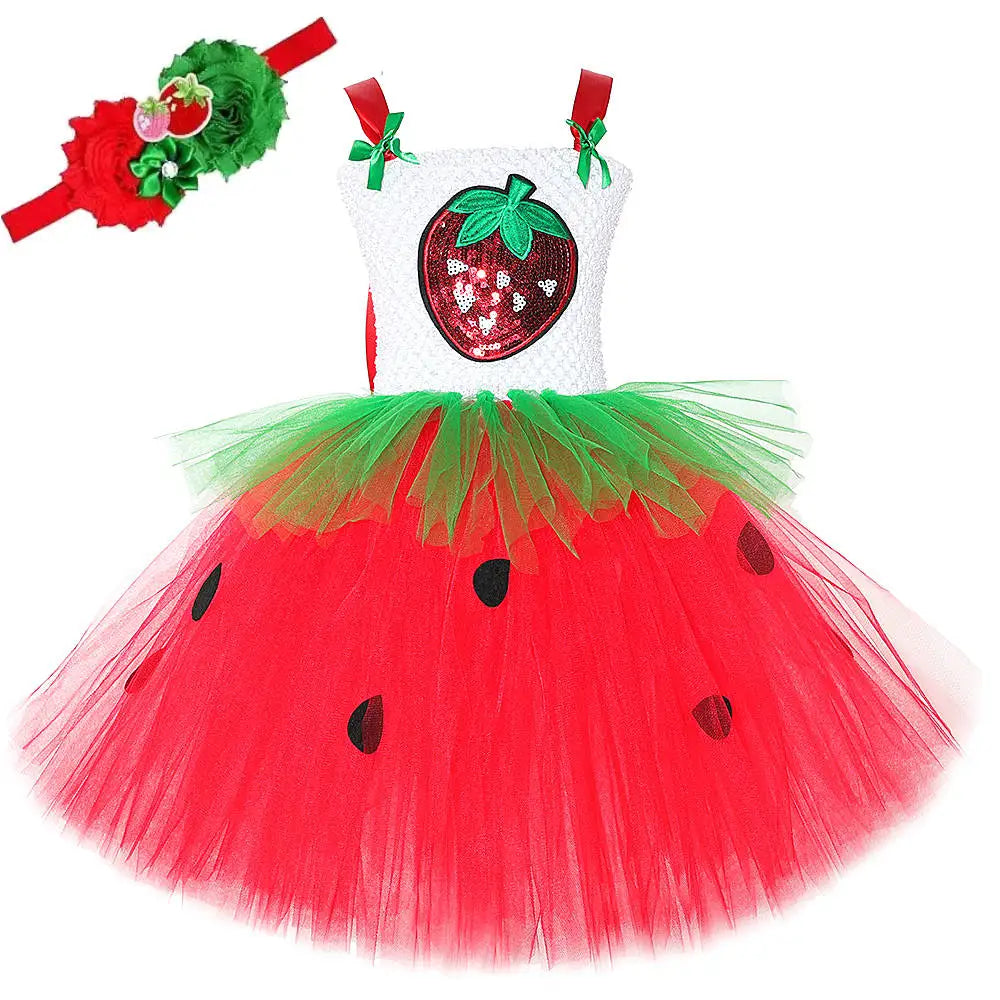Red tutu dress with white crochet top and sequin strawberry applique, green tulle waist, black seed appliques, and red and绿花头