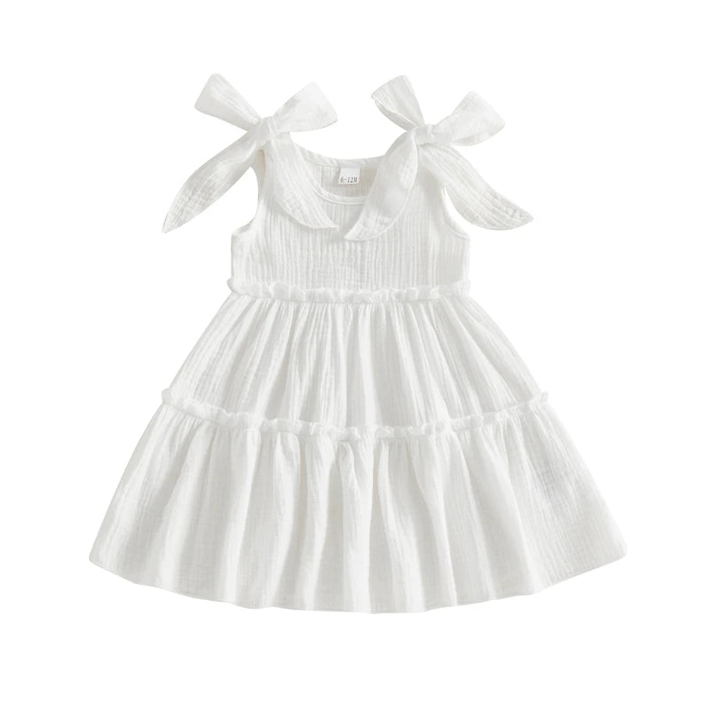 White tie-shoulder tiered dress on white