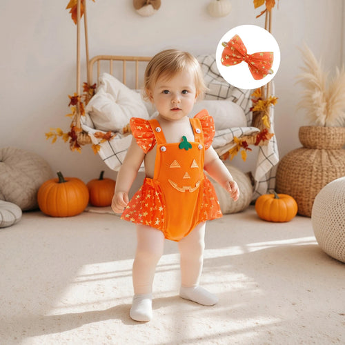 Lifestyle image of baby wearing orange pumpkin romper with bow headband