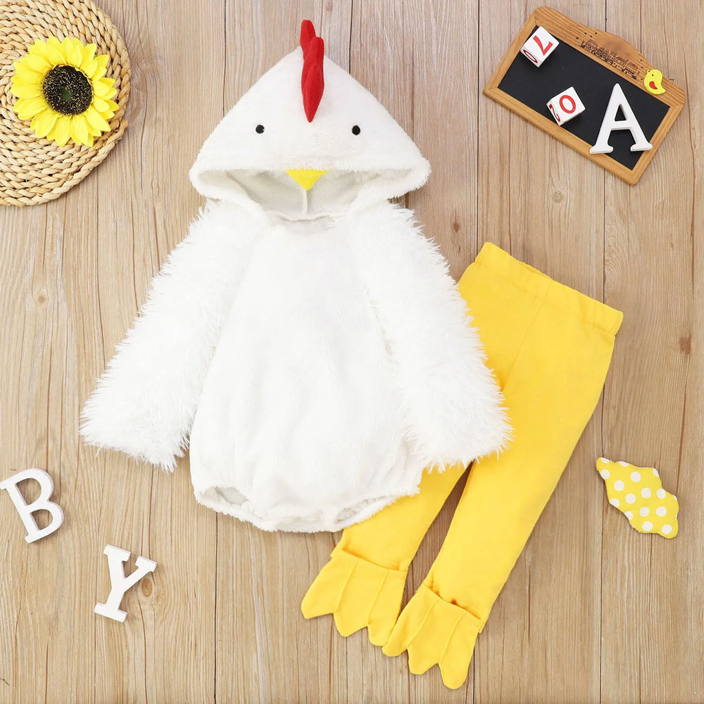 Flat lay of white chick costume set with hooded romper and yellow pants