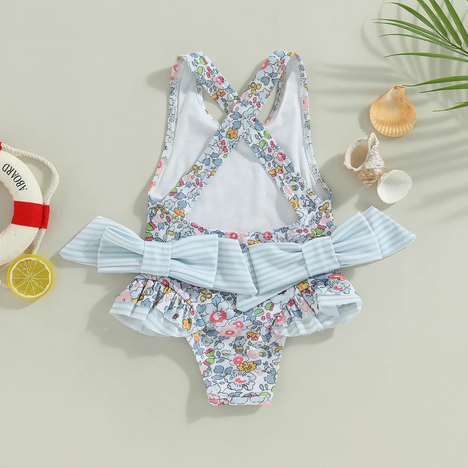 Blue variant of Floral Bow Backless Swimsuit for toddlers