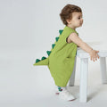 Baby wearing light green dinosaur tail romper costume