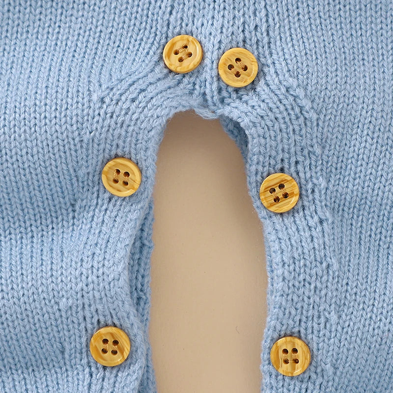 Detail of knit texture on rabbit baby romper