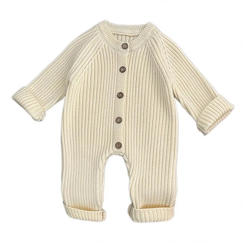 Side view of knitted baby bodysuit