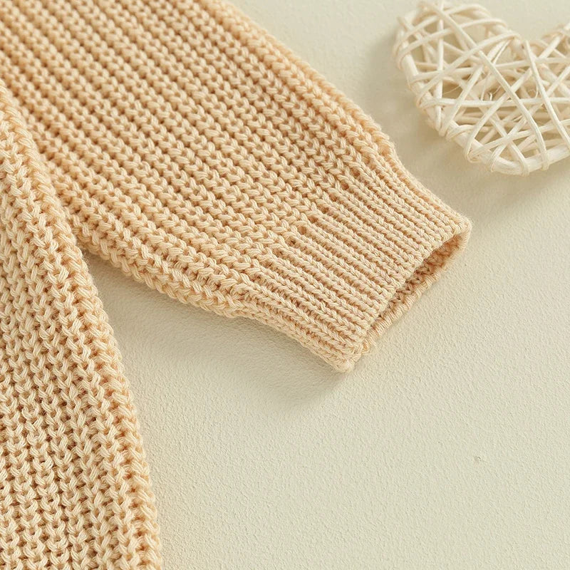 Close view of the knit sleeve and ribbed cuff