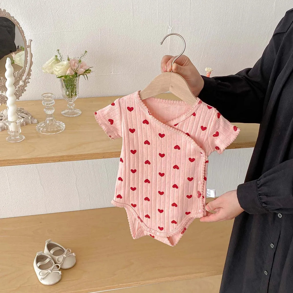 Printed Short-Sleeved Baby Bodysuit folded