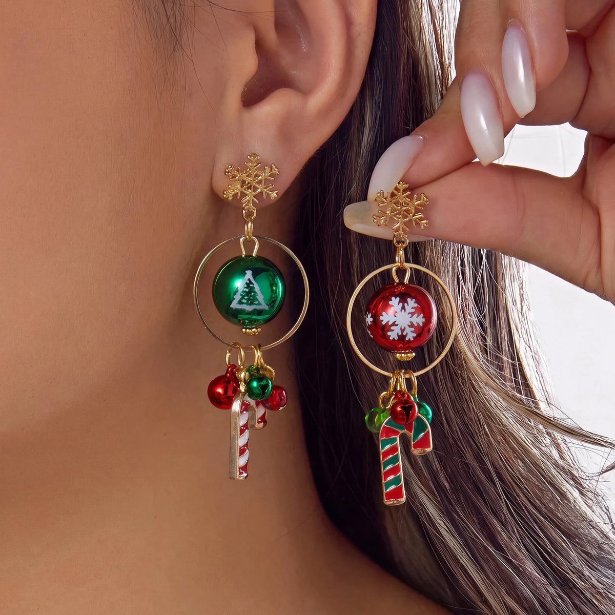 Snowflake tops with glossy red and green bauble designs and hanging candy cane charms.
