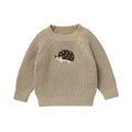 Close-up of Embroidered Hedgehog on Baby Sweater