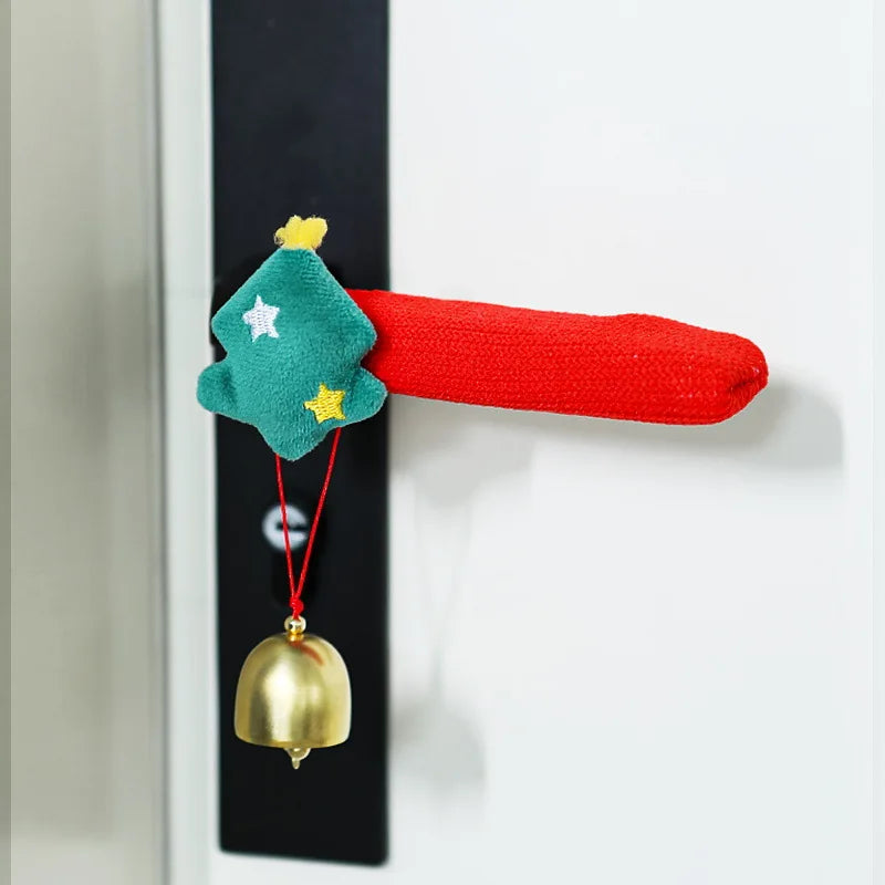 Red fabric door handle cover with a Christmas tree design and hanging bell