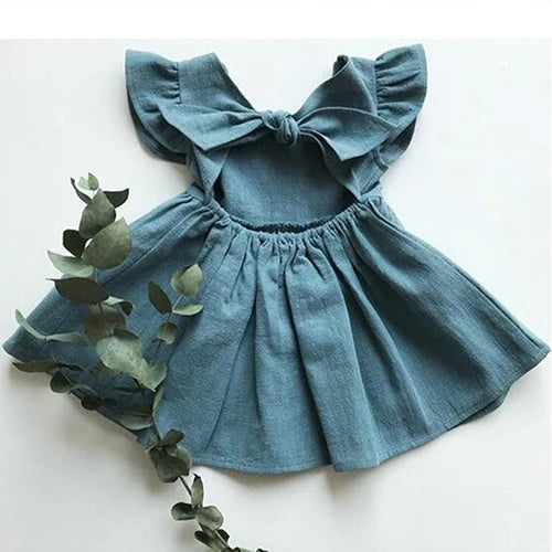 Dusty blue cotton-linen ruffle-back dress flat lay