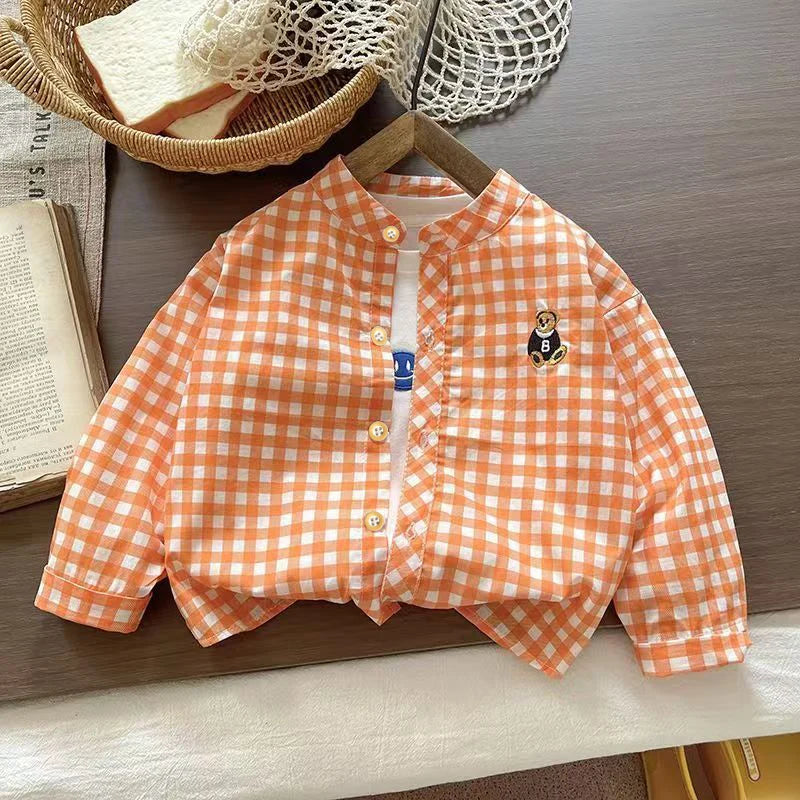 Orange gingham button-up shirt with embroidered bear patch