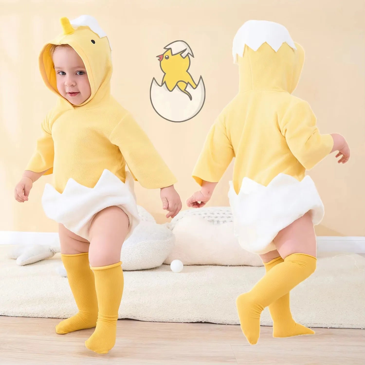 Baby modeling yellow chick costume romper with white eggshell design and hood