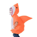 Child wearing orange shark hoodie costume with fin and teeth hood