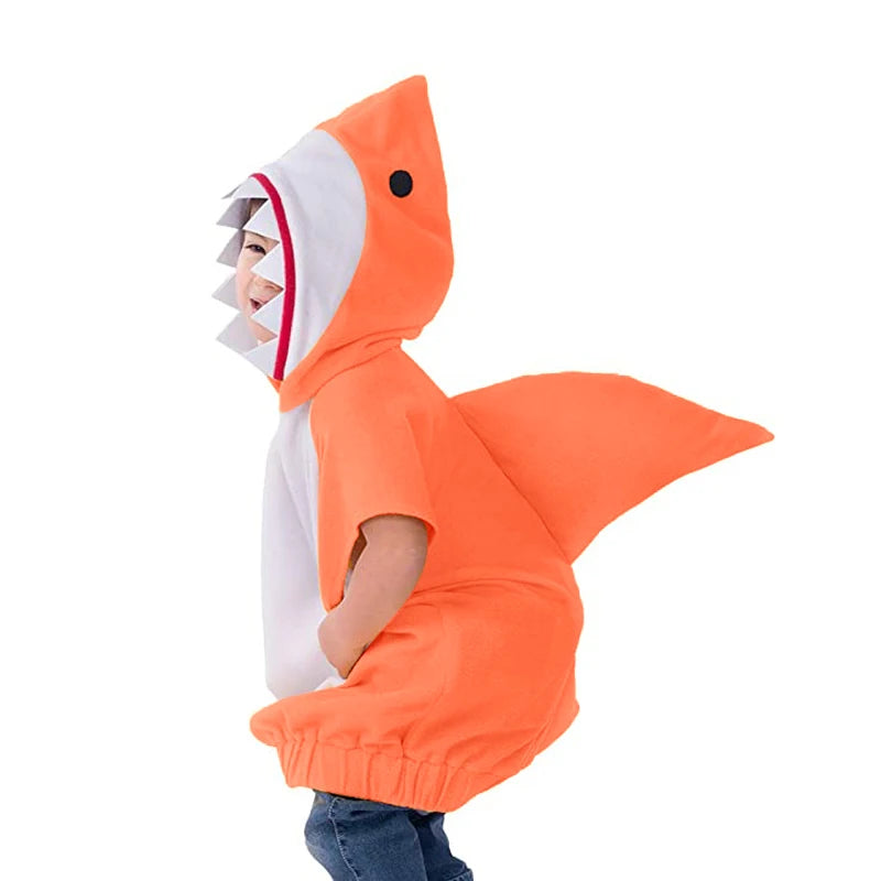 Child wearing orange shark hoodie costume with fin and teeth hood